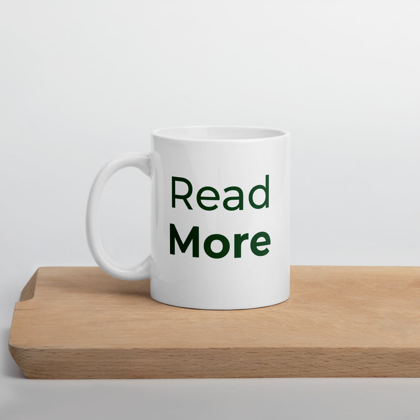 White glossy "Read more" mug